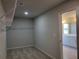 Walk-in closet features carpet flooring and wire shelving, providing ample storage space at 452 Eagles Nest Cir, Auburn, GA 30011