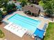 Community pool provides ample seating and is a place of outdoor enjoyment at 452 Eagles Nest Cir, Auburn, GA 30011