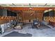 Garage with work area, storage, and a secondary garage door at 5780 Warren Farm Sw Rd, Powder Springs, GA 30127