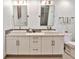 Modern bathroom featuring a double sink vanity with quartz counters, and modern lighting at 805 Peachtree Ne St # 317, Atlanta, GA 30308