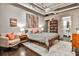 Stylish bedroom with wooden floors, a comfy seating area, and en-suite bathroom at 805 Peachtree Ne St # 317, Atlanta, GA 30308