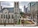 Stone church with a cityscape background, showcasing the beautiful surroundings at 805 Peachtree Ne St # 317, Atlanta, GA 30308