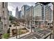 Scenic city view showcasing modern architecture, lush greenery, and a vibrant street scene at 805 Peachtree Ne St # 317, Atlanta, GA 30308