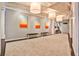 Hallway featuring art and large pendant lighting fixtures at 805 Peachtree Ne St # 317, Atlanta, GA 30308