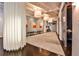 Long hallway featuring recessed lights, exposed beams, light beige carpeting, and interior decor at 805 Peachtree Ne St # 317, Atlanta, GA 30308