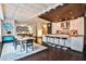 Spacious open kitchen with breakfast bar, modern appliances, and adjacent dining area at 805 Peachtree Ne St # 317, Atlanta, GA 30308