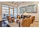 Comfortable living room with modern furniture, a rug, and sliding glass doors to outdoor patio at 805 Peachtree Ne St # 317, Atlanta, GA 30308