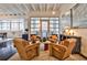 Cozy sitting area featuring modern chairs, accent table, and natural light at 805 Peachtree Ne St # 317, Atlanta, GA 30308