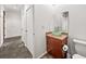 Hallway bathroom featuring a glass bowl sink and modern fixtures at 130 Arizona Ne Ave # 106, Atlanta, GA 30307