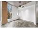 Bright bedroom with large window, concrete ceiling, and ample natural light at 130 Arizona Ne Ave # 106, Atlanta, GA 30307