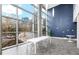 Bright dining space with large windows, long table with ample seating, and stylish interior design at 130 Arizona Ne Ave # 106, Atlanta, GA 30307