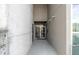 Apartment building entrance with secure entry system and glass door framed by concrete walls at 130 Arizona Ne Ave # 106, Atlanta, GA 30307