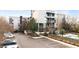 Modern condo building exterior with a swimming pool and parking at 130 Arizona Ne Ave # 106, Atlanta, GA 30307