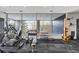 Spacious gym with floor-to-ceiling windows offering outside views and a wide range of exercise equipment at 130 Arizona Ne Ave # 106, Atlanta, GA 30307