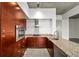 Modern kitchen featuring granite countertops, stainless steel appliances, and updated cabinetry at 130 Arizona Ne Ave # 106, Atlanta, GA 30307