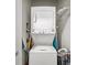 Convenient laundry closet with stacked washer and dryer at 130 Arizona Ne Ave # 106, Atlanta, GA 30307