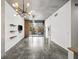 Unfurnished living room with polished concrete flooring and large glass doors to a balcony at 130 Arizona Ne Ave # 106, Atlanta, GA 30307