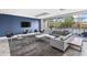 Modern lounge space with comfortable seating, stylish decor, and large windows overlooking community at 130 Arizona Ne Ave # 106, Atlanta, GA 30307