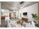 Contemporary living room showcasing a modern couch, open floor plan, and sleek furnishings at 130 Arizona Ne Ave # 106, Atlanta, GA 30307