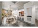 Bright living room with concrete floors, dining area, and an island counter to the kitchen at 130 Arizona Ne Ave # 106, Atlanta, GA 30307