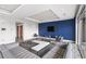 Stylish lounge space with comfortable seating, television, and elegant decor for relaxing or entertaining guests at 130 Arizona Ne Ave # 106, Atlanta, GA 30307