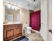 Bathroom featuring a wood vanity, tile flooring, and shower with a curtain at 1069 Eagles Brooke Dr, Locust Grove, GA 30248