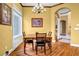 Bright breakfast area featuring hardwood floors, windows, and natural light at 1069 Eagles Brooke Dr, Locust Grove, GA 30248