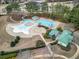 Aerial shot of the community pool with a large slide and recreational area at 1069 Eagles Brooke Dr, Locust Grove, GA 30248