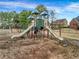 Colorful community playground with multiple slides and climbing structures for children at 1069 Eagles Brooke Dr, Locust Grove, GA 30248