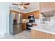 Kitchen featuring stainless steel appliances, tiled floors, and ample cabinet space at 151 Berkshire Dr, Hiram, GA 30141