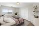 Clean and well-lit bedroom featuring neutral tones, stylish décor, and ample closet space at 1501 Clairmont Rd # 1318, Decatur, GA 30033