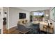 Bright and stylish living room with hardwood floors, modern furniture, and balcony access at 1501 Clairmont Rd # 1318, Decatur, GA 30033