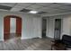 Versatile room with modern flooring offers multiple entryways and abundant natural light, perfect for customization at 3581 Midway Rd, Decatur, GA 30032