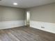 Finished basement with gray walls, white trim, and modern vinyl flooring at 5073 Willow Point Pkwy, Marietta, GA 30068