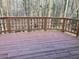 Spacious wooden deck offers great view of the wooded backyard at 5073 Willow Point Pkwy, Marietta, GA 30068