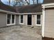 Front entrance of home with stone pathway and large windows on either side of the front door at 5073 Willow Point Pkwy, Marietta, GA 30068