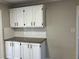 Extended countertop in the kitchen offers additional storage with matching cabinets at 5073 Willow Point Pkwy, Marietta, GA 30068