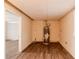 Utility room with modern flooring, a water heater, and access to other parts of the house at 5130 Cornwallis Ct, Stone Mountain, GA 30088