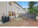 Backyard view, highlighting a small patio, privacy fence, and nearby landscaping at 6040 Oakley Rd, Union City, GA 30291