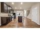 Modern kitchen featuring stainless steel appliances, granite countertops, and an island at 6040 Oakley Rd, Union City, GA 30291
