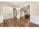 Spacious living room featuring hardwood floors, staircase, and lots of natural light at 6040 Oakley Rd, Union City, GA 30291