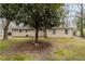 A spacious backyard offers an area for outdoor entertaining at 8673 Chestnut Ln, Lithia Springs, GA 30122