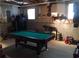 Finished basement with pool table offers a fun and versatile space for recreation and entertainment at 443 Hannah Dr, Temple, GA 30179