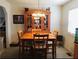 Cozy dining room with classic wooden furniture set, perfect for intimate Gathering meals at 443 Hannah Dr, Temple, GA 30179