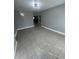 Spacious living room featuring tiled floors, neutral paint, and recessed lighting fixtures at 96 Sir Scott Ct, Lawrenceville, GA 30044