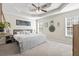 Comfortable bedroom with a ceiling fan, neutral paint, carpet, and bright natural light at 255 N Loblolly Xing, Temple, GA 30179