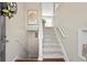 Bright and airy entryway with stairs and a wooden floor at 255 N Loblolly Xing, Temple, GA 30179