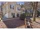 Charming suburban home featuring a well-manicured lawn and a cozy bench to enjoy the outdoors at 255 N Loblolly Xing, Temple, GA 30179