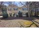 Charming two-story home with a welcoming front yard and inviting staircase entry at 255 N Loblolly Xing, Temple, GA 30179