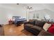 Bedroom featuring a bed, sofa, desk, hardwood floors and natural light at 4550 Wenden Ln, Marietta, GA 30062